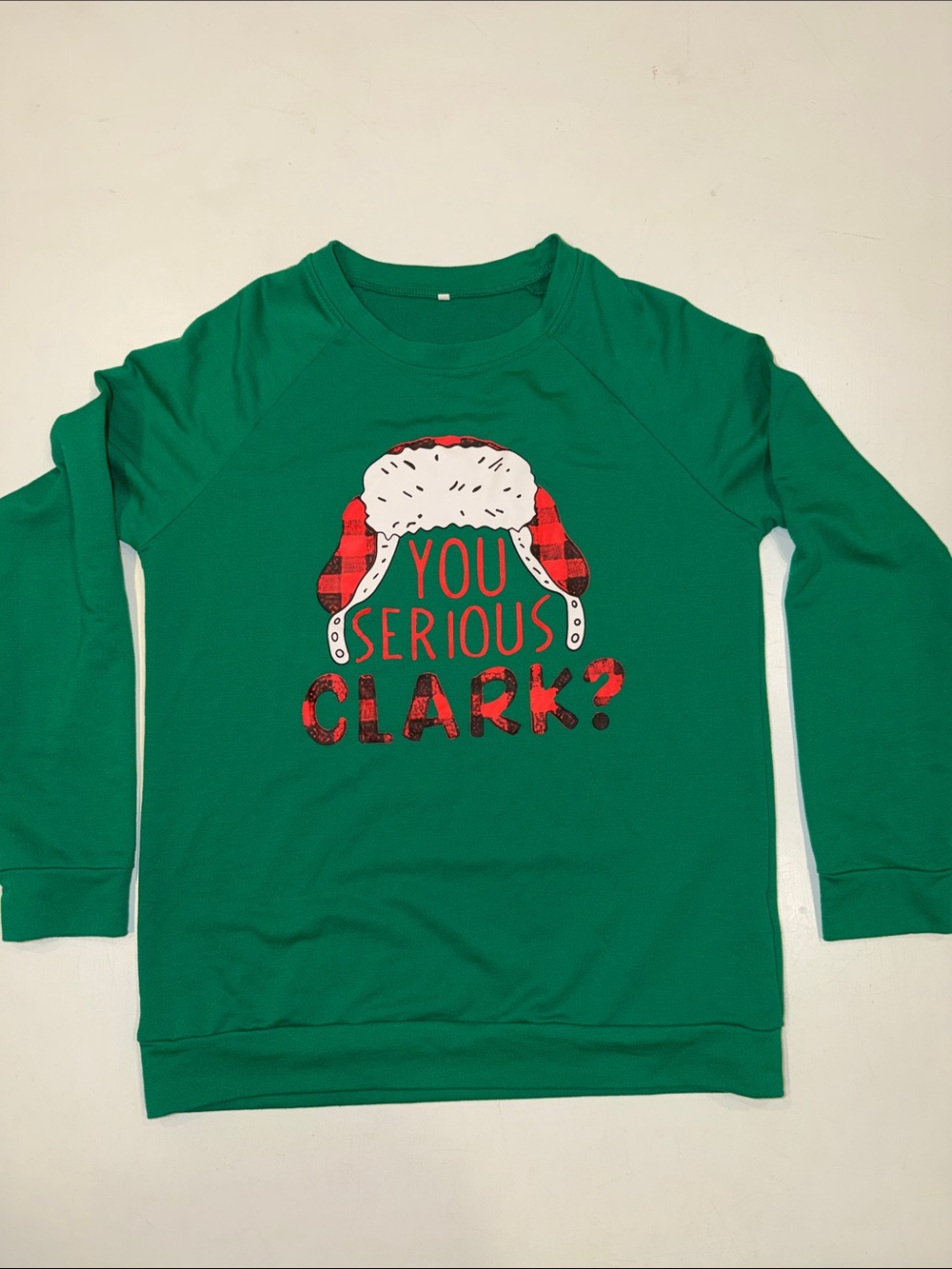 Green Sweatshirt with Red and White Holiday Graphic